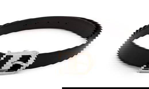 Cartier Silver-Tone Buckle Leather Belt: Cartier Silver-Tone Buckle Leather Belt, with dark brown leather belt strap, marked "Cartier". 49.5" L x 1.75" W. Provenance: From a New York City Collection. Keywords: Fashion, Designer, Garment, Fre
