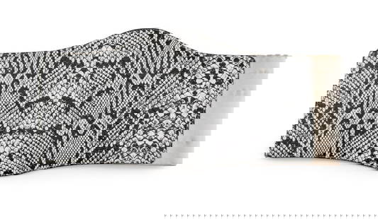 Christian Dior Snakeskin Embossed Leather Belt: Christian Dior Snakeskin Embossed Leather Belt, in black and white with silver-tone snap closures, marked "Christian Dior / Paris / New York". Size S-M. 17.25" L x 7" W. Provenance: From a New York Ci
