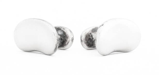 Elsa Peretti for Tiffany & Co. 925 Bean Cufflinks: Pair of Elsa Peretti for Tiffany and Company Sterling Silver Iconic Bean Shaped Cufflinks, worn through cuffs as fixed cufflinks, marked: "(c) Tiffany & Co Sterling Peretti". Measuring 3/4" x 1/2", ap