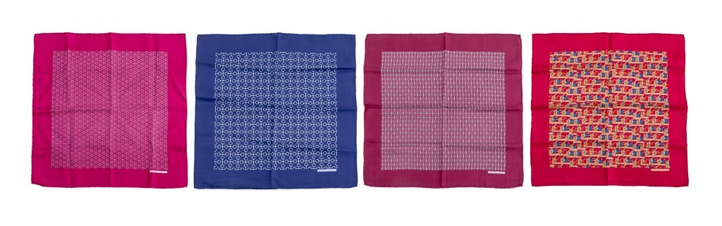 Hermes Silk Pocket Squares, 4: Group of Four Hermes Silk Pocket Squares, in magenta and blue, marked "Hermes-Paris". Largest: 16.75" L x 16" W. Provenance: From a New York City Collection. Keywords: Fashion, Designer, French design