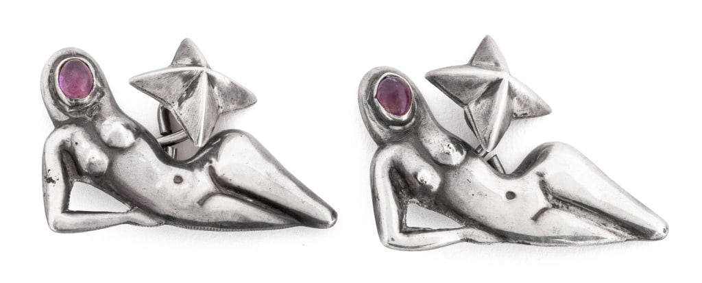 Hubert Harmon Taxco Silver Amethyst Cufflinks: Pair of Hubert Harmon Taxco Sterling Silver Amethyst Nude Woman and Star Motif Cufflinks, comprise of two 5 x 4 mm oval cabochon-cut amethyst stones, marked: "STERLING / HUBERT HARMON / MADE IN MEXICO
