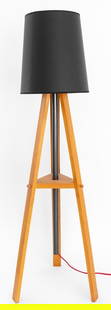 Modern Walnut Tripod Floor Lamp: Modern Walnut Tripod Floor Lamp, with tubular black metal column to center. 58" H x 18.5" W x 18" D. Provenance: From a New York City Collection. Keywords: Lighting, Standing lamp, Tripodal, Interior