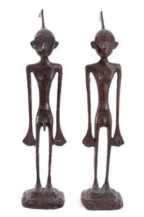 Giacometti Style Patinated Metal Nude Figures, Pr: Pair of Giacometti Style Patinated Metal Nude Male and Female Figures, apparently unsigned. 18.5" H x 4" W x 3" D. Provenance: From an Upper West Side estate located at the Ansonia. Keywords: