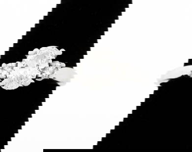 Platinum Oval Diamond Engagement Ring: Platinum Oval Diamond Engagement Ring, featuring one prong set oval brilliant cut diamond, weighing approx. 0.86 carat, F-G color / VS2 clarity, flanked by two prong set round brilliant cut diamonds