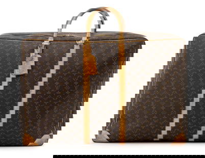 Louis Vuitton Monogram Soft Side Luggage Case: Louis Vuitton Monogrammed Canvas Soft Side Luggage Case, with leather trim and two handles, marked "(c) / Louis Vuitton / Paris / made in France" to label inside. 19" H x 28.5" W x 9" D. Provenance: F