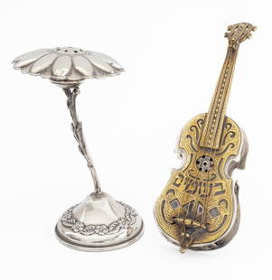 Netafim 55 Etc. Silver Besamin Spice Containers, 2: Two Sterling Silver Besamin Spice Containers, comprising: Floriform container marked "925" to underside, and Netafim 55 guitar form container with easel back, with gilded details and Hebrew script to