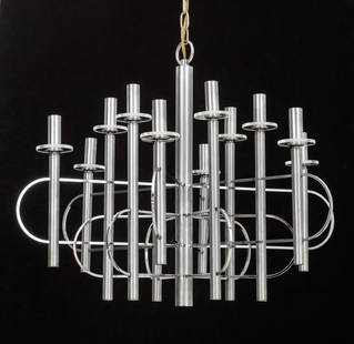 Gaetano Sciolari 12-Light Chrome-Plated Chandelier: Gaetano Sciolari Twelve-Light Chrome-Plated Chandelier, 1970s, with clear glass drip plates. 32" H x 27" Diameter. Provenance: From a Chappaqua, New York Collection. Keywords: Designer, Lighting, Ceil