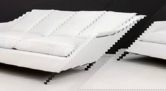 Modern White Leather Upholstered Large Sofa: Modern White Leather Upholstered Large Sofa, "Zagaroli Classics" label beneath cushions. 33" H x 90" W x 35.5" D; seat: 20" H. Provenance: From a Chelsea, New York City Collection. Keywords: American