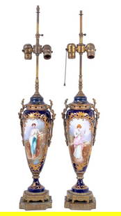 Sevres Blue Ground Porcelain Vases as Lamps, Pair: Pair of Sevres Blue Ground Porcelain Vases Mounted as Lamps, late 19th century, signed "E Grivard", each of ovoid form with gilt metal mounts and painted panels of ponderous romantic ladies and sprays