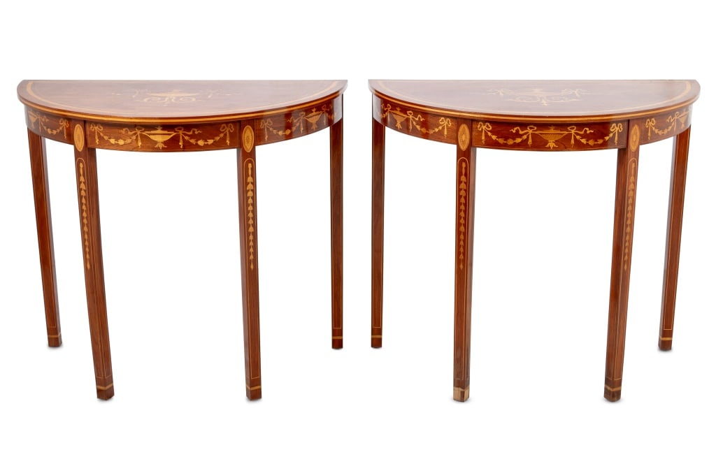 George III Style Mahogany Console Tables, Pair: Pair of George III Style Mahogany and Marquetry D-Shaped Console Tables, 20th century, each inlaid with crossbanded borders, bell flower swags and trophies, on square legs. 31" H x 36" W x 18" D. Keyw