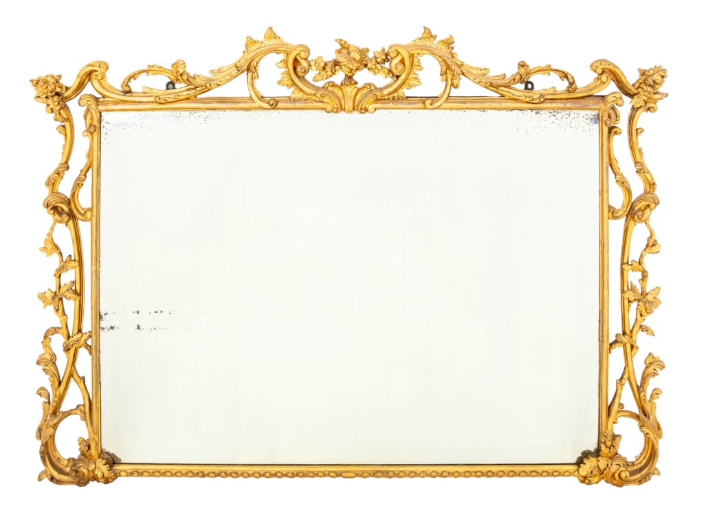 Georgian Giltwood Overmantel Mirror: Georgian Giltwood Overmantel Mirror, 19th century, with beveled glass mirror plate surrounded by scrolling foliate swaths. Mirror plate: 31.75" H x 44.5" W; frame: 40.75" H x 56.5" W x 3" D. Provenanc