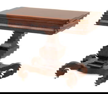 American Empire Mahogany Flip-Top Center Table: American Empire Flame Mahogany Flip-Top Center Table, on central turned wood support and four scroll form feet on casters. 31" H x 37.25" W x 37.5"; 18.5" D. Provenance: From a Greenwich, Connecticut