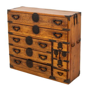 Japanese Iron-Mounted Tansu Cabinet, 19th C.: Japanese Iron-Mounted Tansu Cabinet, late 19th century, possibly camphor wood, with ten drawers and side handles. 40" H x 45.5" W x 15.5" D. Provenance: From a New York City Collection. Keywords: