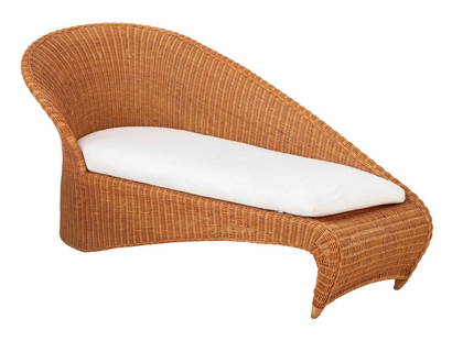 Varaschin Attr. Italian Wicker Chaise Longue: Varaschin attributed Italian Woven Wicker Chaise Longue, with swoop back design and white cushion. 37" H x 71" W x 31" D. Provenance: From a Vintage Collection of Italian Designer Furniture Samples. K