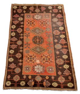 Caucasian Rug, 9' 8" x 5' 2": Caucasian Rug, orange ground with brown border. 9' 8" L x 5' 2" W. Provenance: From a New York City Collection. Keywords: Area Rug, Carpets, Textiles, Floor covering, Wool, Vintage, Interior design, D