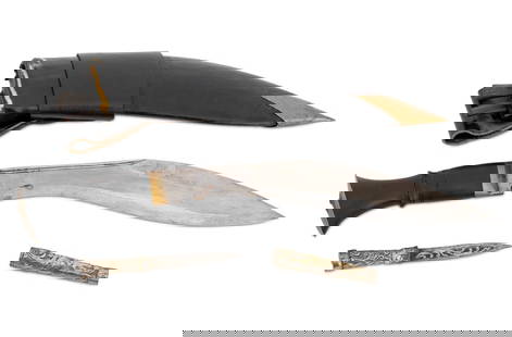 Indian Gurkha Kukri Knife and Silver-Tone Knife, 2: Group of Two Knives, comprising: Indian Gurkha Kukri Knife in black leather sheath with sharpened brass cap and two additional blades with ebony handles, blade marked with mountains, crescent moon and