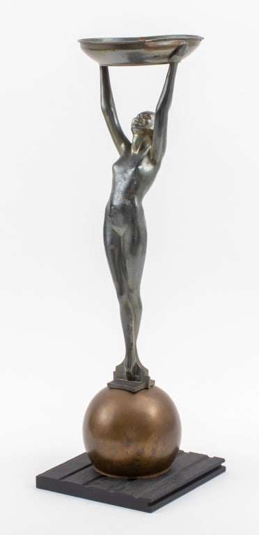 Arthur von Frankenburg Female Figure Smoking Stand: Arthur von Frankenberg (American, 1889-1950) Female Figure Smoking Stand, designed 1929, patinated metal, patented Pat. No. 80,059, nude woman on a sphere holding an ash receptacle. 23.75" H x 7.25" W