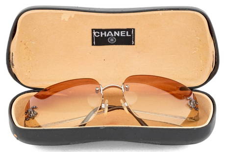 Chanel 4017-D Sunglasses: Pair of Chanel 4017-D Sunglasses, with pink to clear gradient lenses, with silver-tone rhinestone studded "CC" logo to each lens, marked "Chanel / Made in Italy" and "4017-D c.124/89 6217 120" to the
