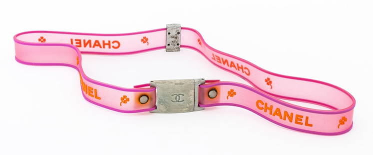 Chanel 01P Pink and Orange Rubber Belt: Chanel 01P Pink and Orange Rubber Belt, 2001, with logo and silver tone buckle, marked "Chanel / 01 / P". 30.25" L. Provenance: From a New York City Collection. Keywords: Fashion, Accessories, Designe