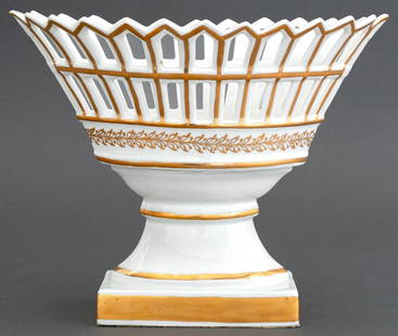 Spanish Porcelain Oval Jardiniere: Spanish Porcelain Oval Jardiniere, with reticulated ovoid basket above rectangular base and gilt-painted decoration, marks to underside. 7.5" H x 9.25" W x 5" D. Provenance: From a Fifth Avenue Collec
