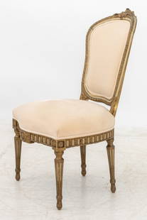 Louis XVI Style Gilt and Painted Chair: Louis XVI Style Gilt and Painted Chaise, late 19th century, with beige velvet upholstered back and seat on four fluted tapered legs. 40.25" H x 24" W x 27" D; seat: 19" H. Provenance: From an East 72n