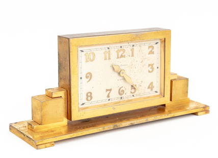 Waltham Art Deco 8-Day Brass Mantel Clock: Waltham Art Deco 8-Day Brass Mantel Clock, with white painted clock face and brass numbers, marked "Waltham / 8 Days". 4" H x 9" W x 2.75" D. Provenance: From a Manhattan Collector. Keywords: Timepiec