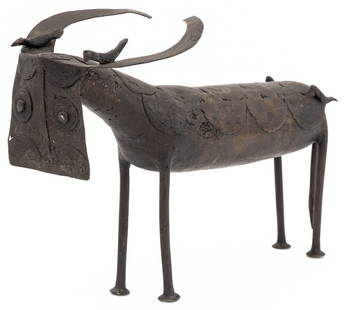 African Water Buffalo Patinated Bronze Sculpture: African Water Buffalo Patinated Bronze Sculpture, probably Dogon, the figure with birds at horns. 8.5" H x 12.5" W x 5" D. Provenance: From a West 12th Street Estate. Keywords: African Arts, Bronzier,
