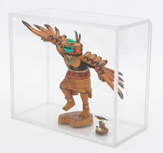 Hopi Painted Carved Wood Sculptures, 2: Two Hopi Painted Carved Wood Sculptures, comprising: kachina eagle doll, 1989, signed "mdallasnk" to the base and dated to the underside and miniature bird on a tree stump base, 1996, signed "Isroel"