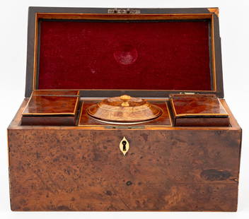 George III Yew Wood Tea Caddy, 19th C.: George III Yew Wood Tea Caddy, 19th century, with hinged lid opening to three lidded compartments the central being a cylinder porcelain jar. 6" H x 12" W x 6" D. Provenance: From a 35 East 75th Stree