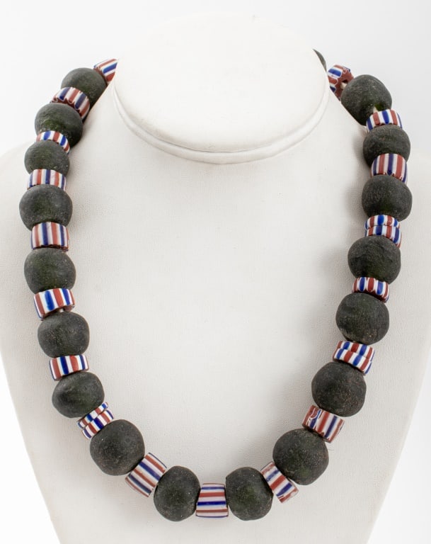 Antique Italian Murano Glass Trade Beads: Antique Italian Murano Glass Trade Beads, 19th century, comprising 21 green glass spherical beads and 23 red, white, and blue millefiori beads. Green bead: 1" Diameter approx. Provenance: From a New Y