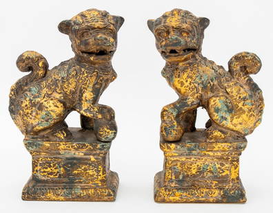 Chinese Gilt Metal Foo Lion Sculptures, Pair: Pair of Chinese Gilt Metal Foo Lion Sculptures, each with paw atop orb above rectangular base. 9.5" H x 5.5" W x 3.25" D. Provenance: From a Greenwich, Connecticut Collection. Keywords: Asian Arts, Ch