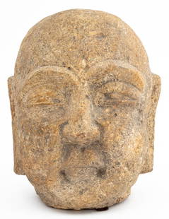 Chinese Carved Stone Buddha Head: Chinese Carved Stone Buddha Head, possibly Ming Dynasty. 8.25" H x 6.75" W x 6.25" D. Provenance: From a West 12th Street Estate. Keywords: Asian Arts, China, Carving, Statue, Sculpture, Bust, Buddhis