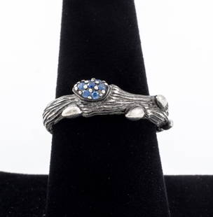 Stephen Dweck Silver Sapphire & Diamond Ring: Stephen Dweck Sterling Silver Blue Sapphire and Diamond Naturalistic Motif Ring, comprised of seven pave-set round faceted blue sapphire stones and one round single cut diamond, approx.0.01ct. burnish