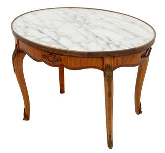 Italian Louis XVI Style Marble Top Coffee Table: Italian Louis XVI Style Carrara Marble Top Gilt Metal Mounted Wood Low Table, marked "Made in Italy" to underside. 21" H x 30.25" W x 23" D. Provenance: From a New York City Collection. Keywords: Euro