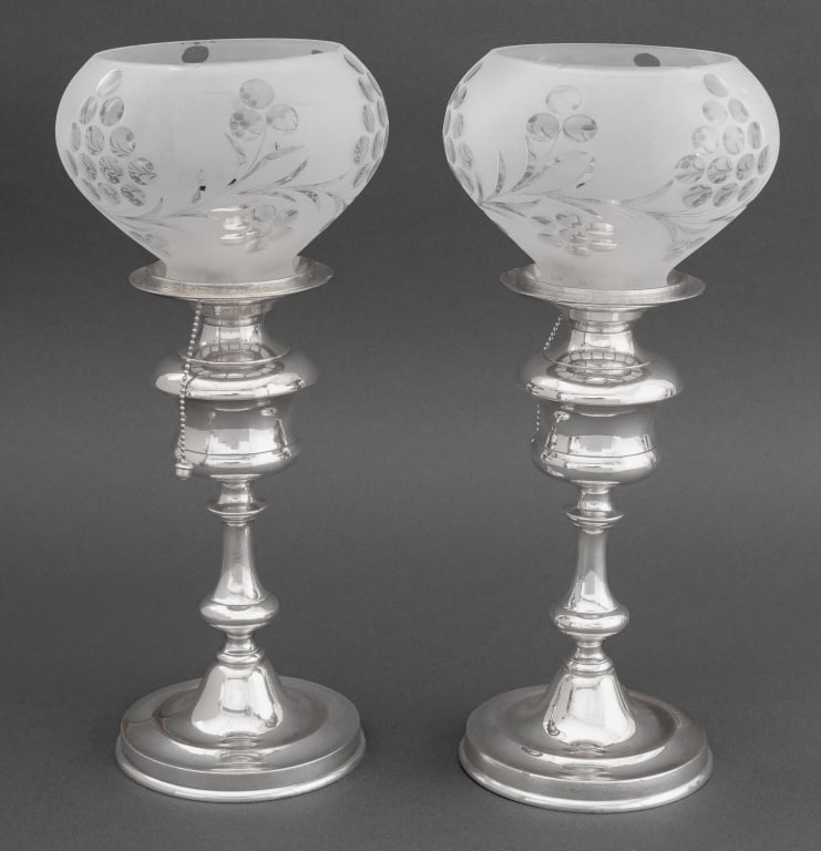 Silvered Metal & Etched Glass Lamps, Pair: Pair of Silvered Metal and Etched Glass Table Lamps, with floral etched glass shades. 11.5" H x 5.25" Diameter. Provenance: From a Palm Beach Collection. Keywords: Lighting, Table lamps, Accent lamps,
