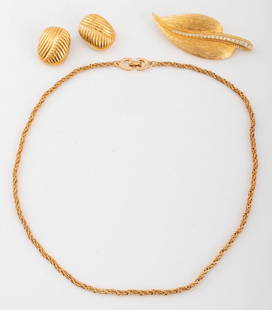 Christian Dior Gold-Tone Metal Jewelry, 3 Pieces: Group of Three Christian Dior Gold-Tone Metal Jewelry Pieces, comprising: one chain necklace, one pair of ribbed clip earrings, and one leaf form brooch pin mounted with gemstones, all marked. Chain: