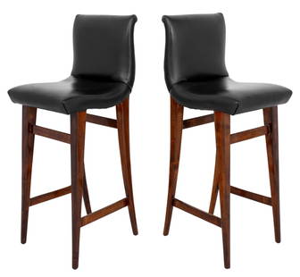 Mid-Century Modern Style Black Bar Stools, Pair: Pair of Mid-Century Modern Style Black Faux Leather Upholstered Bar Stools, on mahogany stained tapered wood legs. 40" H x 14" W x 17" D; seat: 29" H. Provenance: Property from a Midtown Manhattan Pri