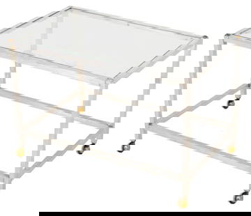Postmodern Glass-Topped Chrome Coffee Table: Postmodern Glass-Topped Chrome Coffee Table, with brass accents to corners and atop four casters. 18.5" H x 27.5" W x 16.5" D. Provenance: From a New York City Collection. Keywords: Modern Furniture,
