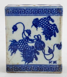 Chinese Blue & White Porcelain Opium Pillow: Chinese Blue and White Glazed Porcelain Opium Pillow of Headrest, with lion design, pierced on top with double happiness symbol and pierced below to fill with sand. 5.25" H x 4.5" W x 2.25" D. Provena