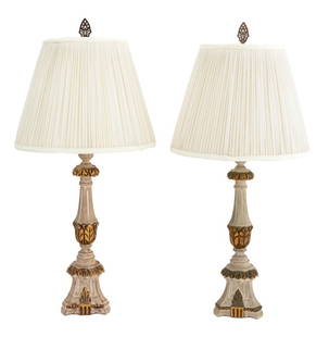 Gilt & Painted Wood Candlestick Lamps, Pair: Pair of Neoclassical Style Gilt and Painted Carved Wood Candlestick Form Table Lamps, with pleated white fabric shades and reticulated brass finials. 31" H x 14" Diameter. Provenance: From a Greenwich