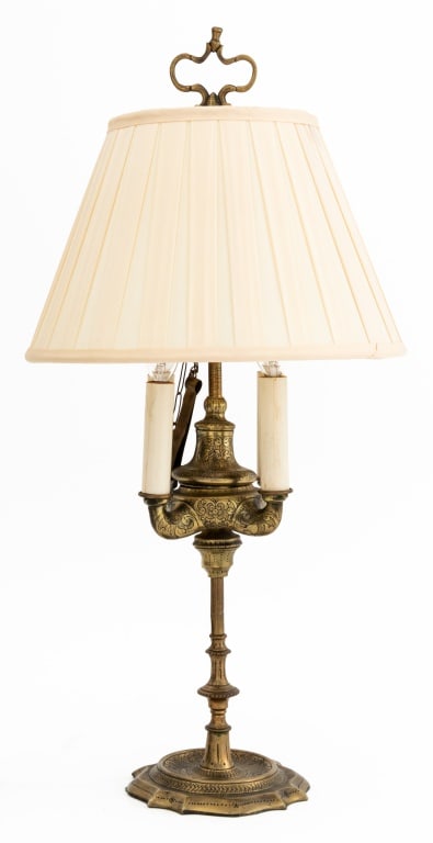 French Brass Bouillotte Four-Light Lamp: French Brass Bouillotte Four-Light Lamp, modeled after whale oil lamp, with scroll and floral design on shaped base. Overall: 24.5" H x 12.25" Diameter. Provenance: From a Park Avenue Estate. Keywords