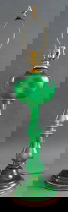 Mid-Century Modern Green Glass Table Lamp: Mid-Century Modern Green Glass Table Lamp, by the Marbro Lamp Co. of Los Angeles, of oil lamp pedestal form in parcel gilt green glass on circular base. 35" H x 8" Diameter. Provenance: From a New Yor