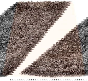 Modern Gray Satin Shag Rug, 8' x 5': Modern Gray Satin Shag Rug. 8' L x 5' W. Provenance: Property from an 11th Avenue Duplex. Keywords: Carpet, Room-size, Retro, Floor covering, Textiles, Decorative Arts