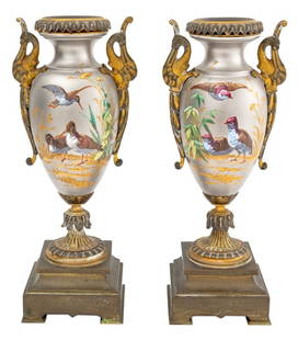Paris Porcelain Brass Mounted Vases, 19th C.: Pair of Paris Porcelain Brass Mounted Vases, 19th century, with griffin form handles, painted bird scenes on acanthus leaf bases mounted on square brass bases. 11.5" H x 4.5" W x 3.5" D. Provenance: F
