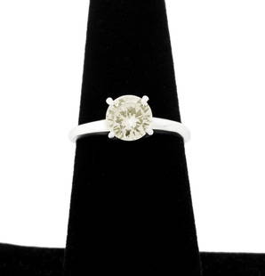 Platinum Diamond Solitaire Engagement Ring: Platinum Diamond Solitaire Engagement Ring, featuring one prong set round brilliant cut diamond J-K color / VS2 clarity, approx. 1.15 carats, marked: "Rhapsody 10% Irid. Plat.". Measuring approx. US s