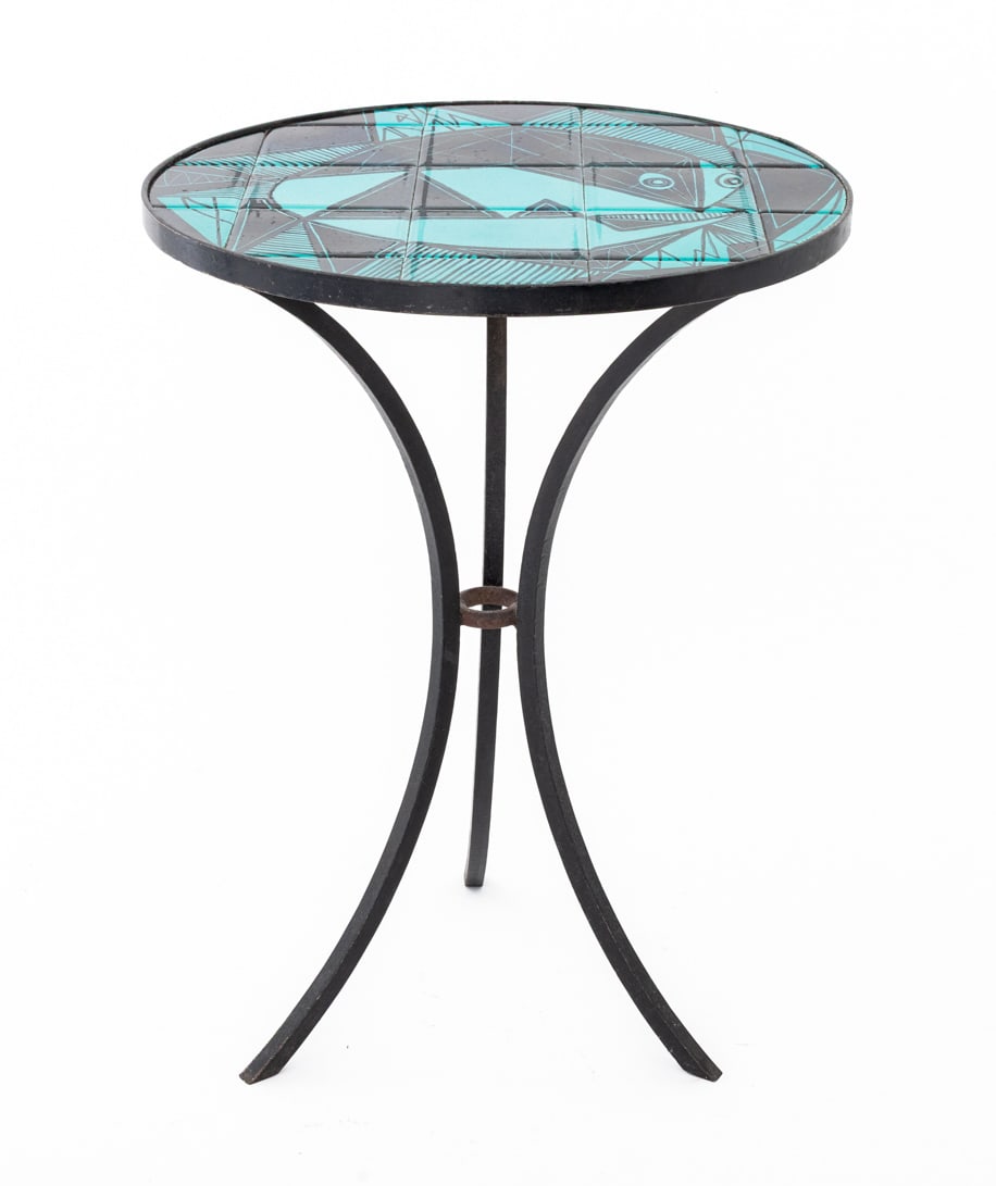 Modernist Blue Ceramic Tile Top Iron Side Table: Modernist Blue Glazed Ceramic Tile Top Wrought Iron Side Table, with Cubist style cyan and black fish design on tripod base. 24.25" H x 17.75" Diameter. Provenance: From a Chelsea Estate. Keywords: Vi