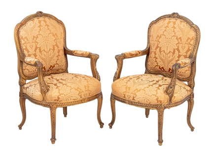 Regency Style Giltwood Fauteuils, Pair: Pair of Regency Style Giltwood Fauteuils, late 19th century, with beige and gold floral upholstery on cabriole legs with claw and ball feet. 41" H x 27" W x 21" D; seat: 20" H. Provenance: From an Eas