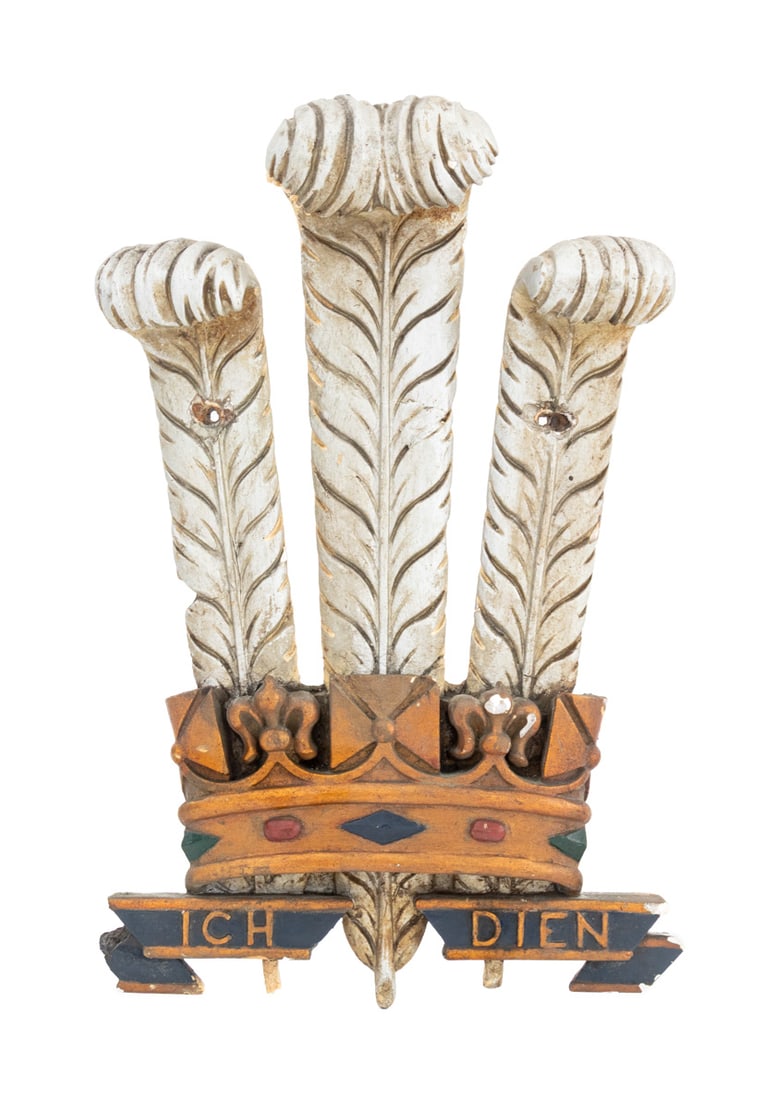 Prince of Wales Gilt & Painted Royal Warrant Crest: English Prince of Wales Painted and Gilt Plaster Royal Warrant Crest, late 19th century, three crowned feathers with "Ich / Dien" banner. 15" H x 9.75" W x 2.5" D. Provenance: The Upper East Side Esta