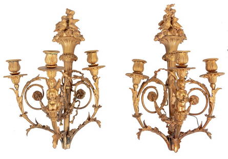 Louis XVI Style Gilt Bronze Appliques, Pair: Pair of Louis XVI Style Gilt Bronze Three-Branch Candle Sconces, late 19th century, each with scrolled branches, floral swags and ribbons, issued from a flambeaux and nesting birds. 20" H x 13" W x 12