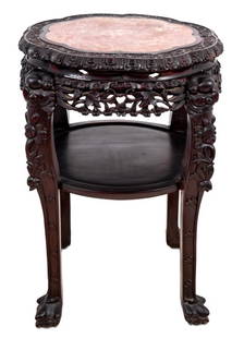 Chinese Hardwood and Marble Pedestal Table: Chinese Carved Hardwood and Marble Two-Tier Pedestal Table, late 19th century, the inset lobed top above mask head, carved legs with claw and ball feet, joined by an undertier. 32" H x 20" W x 20" D.